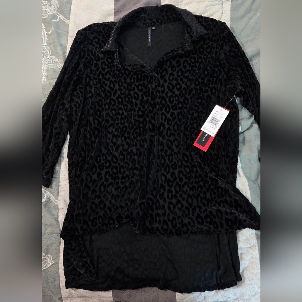 Black Cheetah Long Sleeve Blouse. A little loose fitting